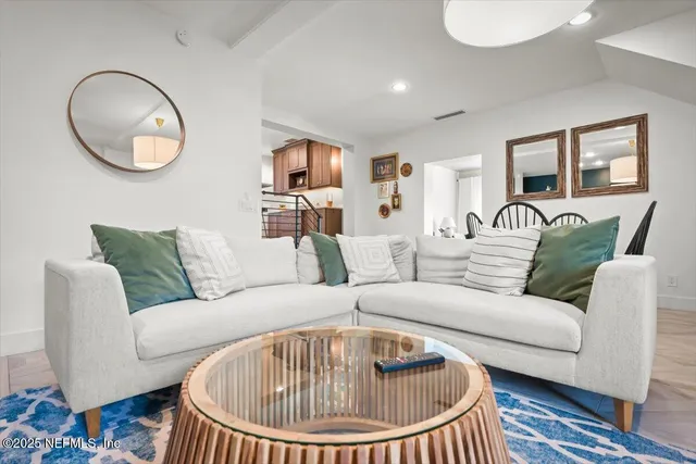 a view of house with swimming pool yard and outdoor seating