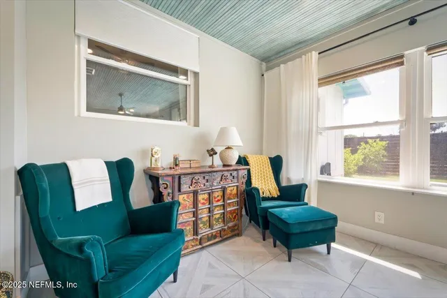 a bedroom with a bed and a table