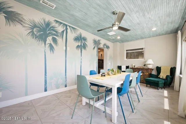 a spacious bathroom with a double vanity sink a mirror and a shower