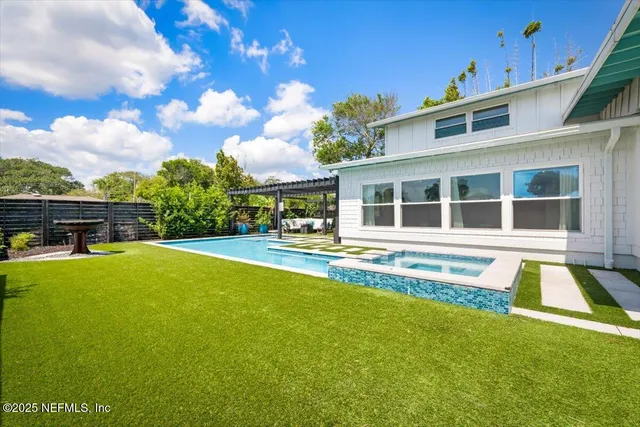 a view of staircase with white walls