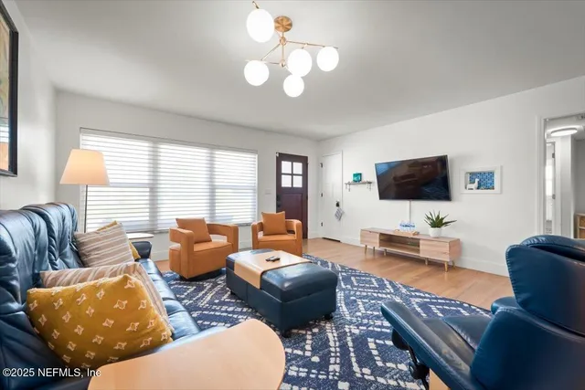 a view of entryway with wooden floor