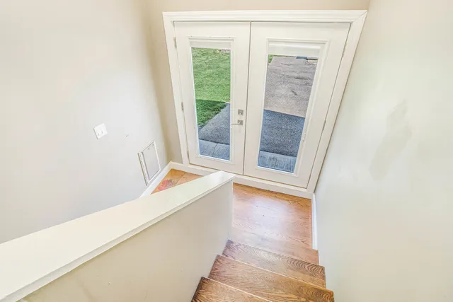 a room with a large window and tub