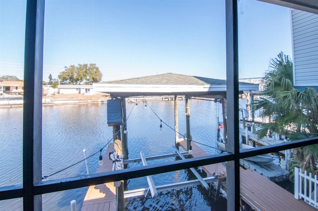 5313 Boardwalk Street Holiday, FL 34690 - Photo 61 of 69 a view of a balcony with wooden floor
