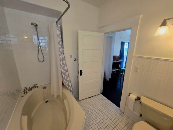a bathroom with a sink and shower