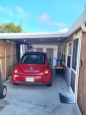 a front view of a house with parking