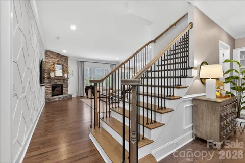 a view of entryway with wooden floor