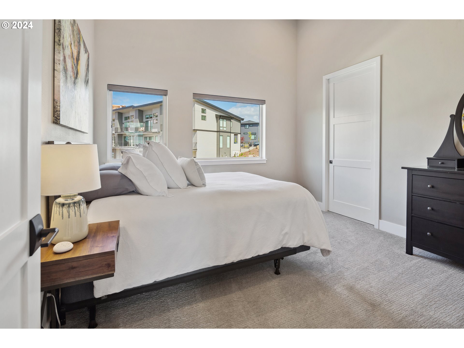 19915 Southeast Ascension Loop Camas, WA 98607 - Photo 19 of 42 a bedroom with a bed and wooden floor