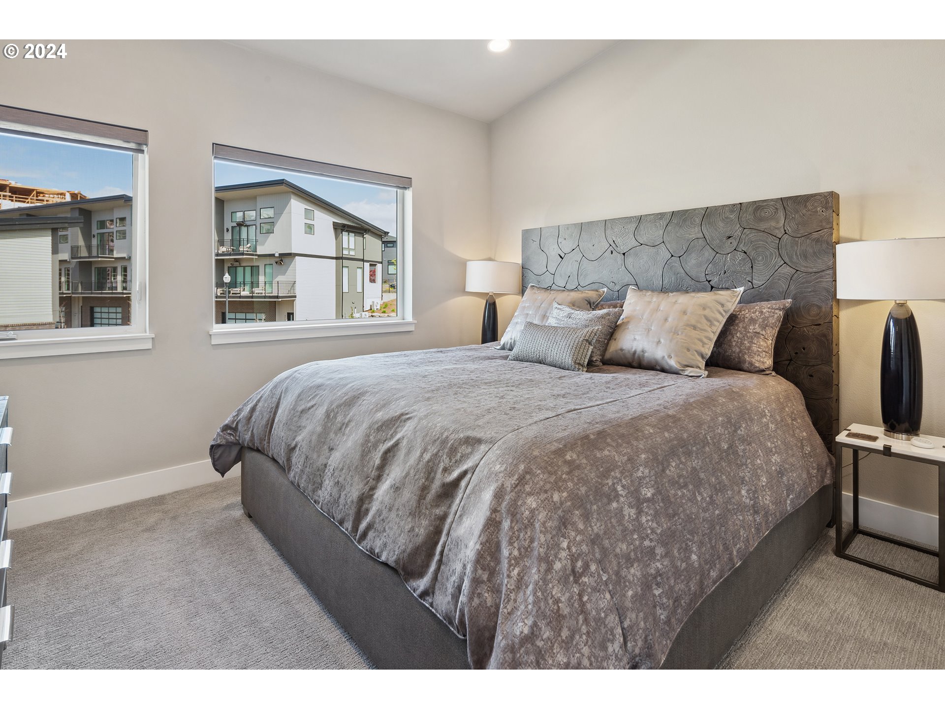 19915 Southeast Ascension Loop Camas, WA 98607 - Photo 21 of 42 a bed sitting in a bedroom next to a window