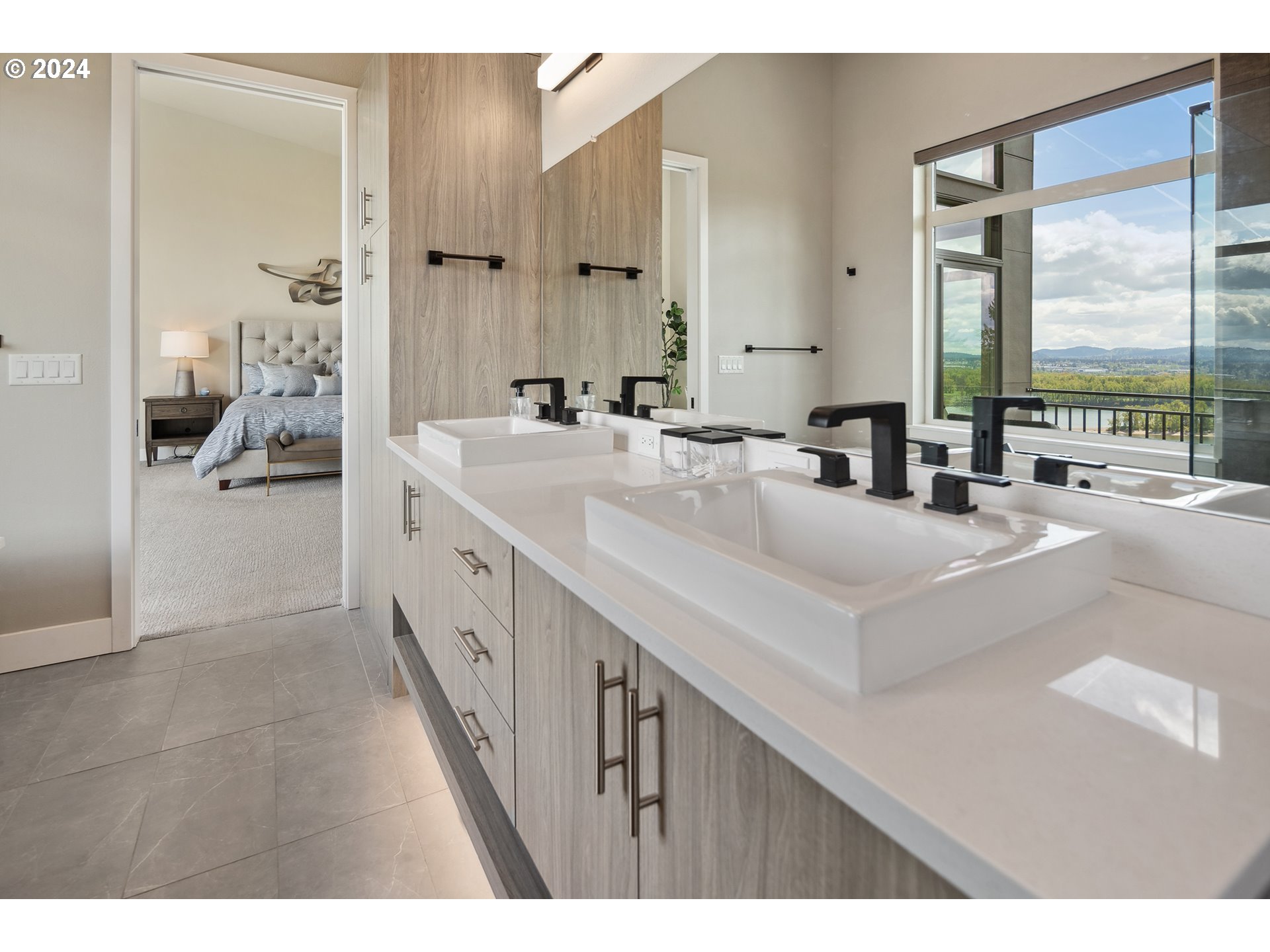19915 Southeast Ascension Loop Camas, WA 98607 - Photo 33 of 42 a bathroom with double vanity and a bathtub