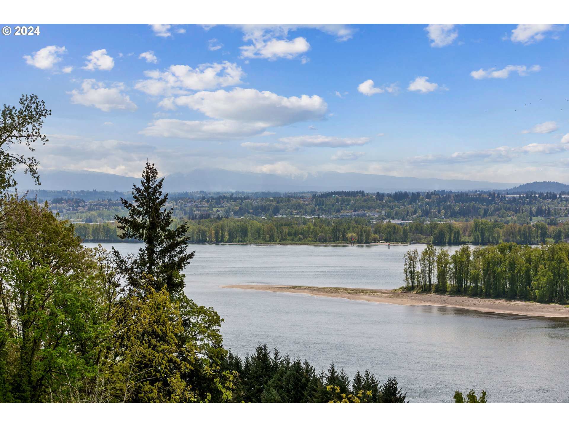 19915 Southeast Ascension Loop Camas, WA 98607 - Photo 41 of 42 a view of a lake from a yard