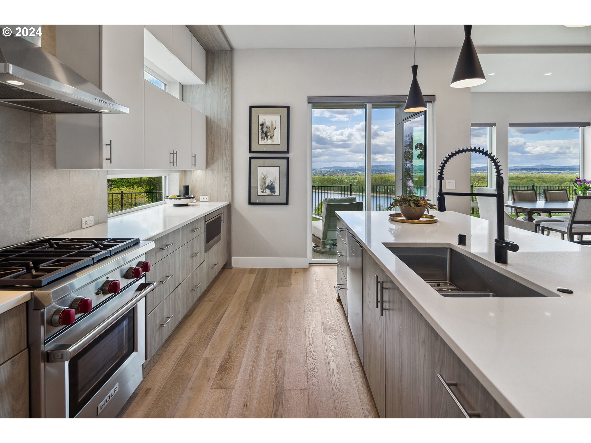 19915 Southeast Ascension Loop Camas, WA 98607 - Photo 5 of 42 a kitchen that has a sink and a stove