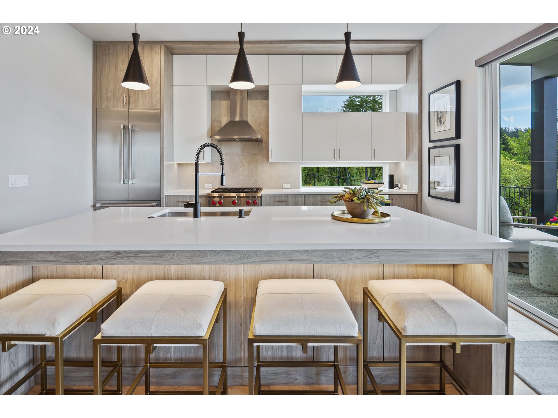 19915 Southeast Ascension Loop Camas, WA 98607 - Photo 7 of 42 a kitchen with a table chairs and a chandelier