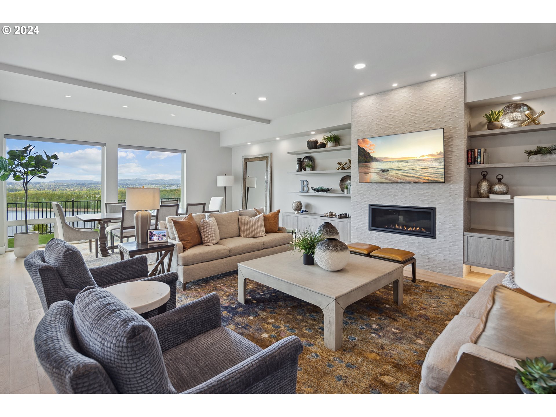 19915 Southeast Ascension Loop Camas, WA 98607 - Photo 10 of 42 a living room with fireplace furniture and a flat screen tv