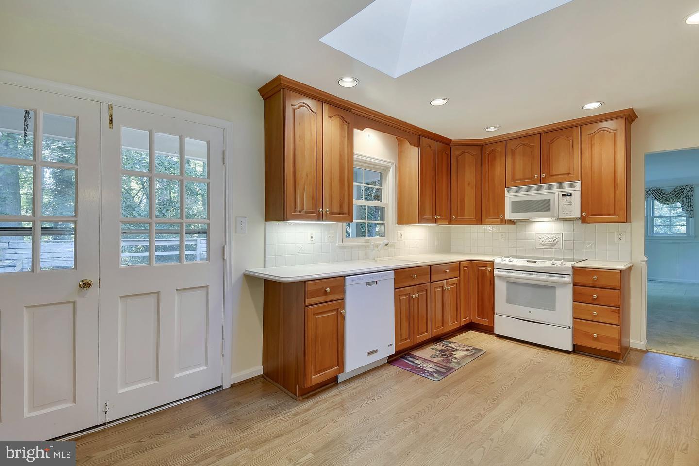 2025 Post Road Vienna, VA 22181 - Photo 14 of 24 Kitchen with French Doors to Deck