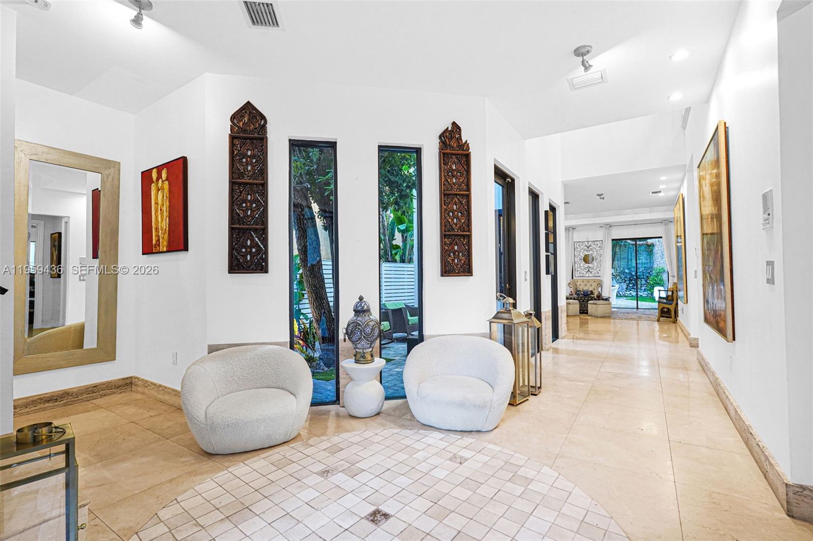 3675 Loquat Avenue Miami, FL 33133 - Photo 28 of 65 a living room with furniture