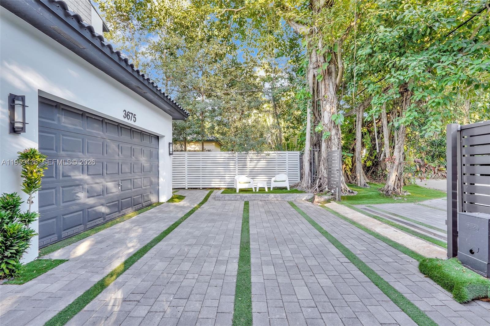 3675 Loquat Avenue Miami, FL 33133 - Photo 6 of 65 a view of a back yard