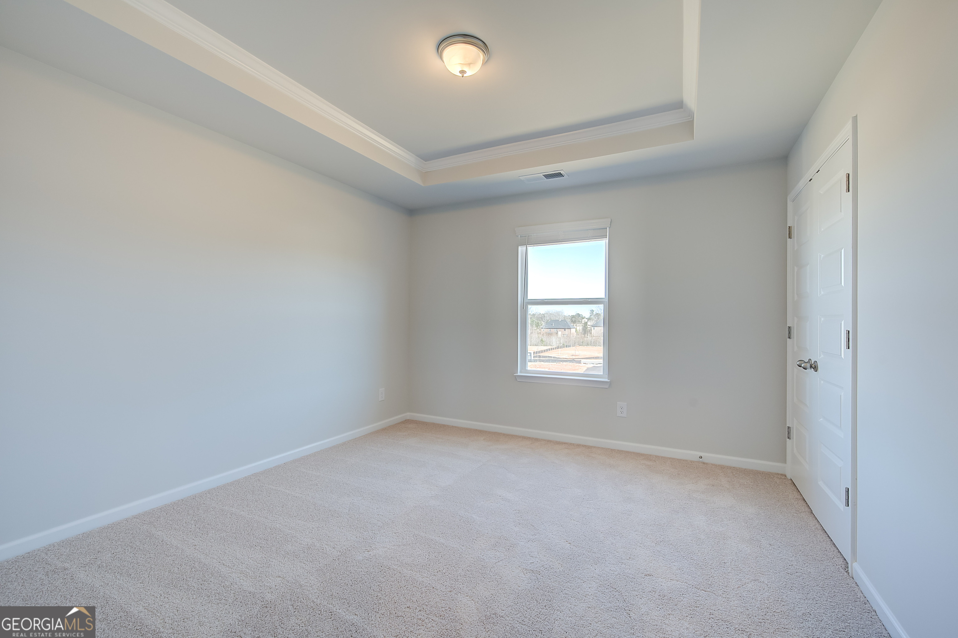 416 Hatcher Court Hampton, GA 30228 - Photo 19 of 30 an empty room with a window