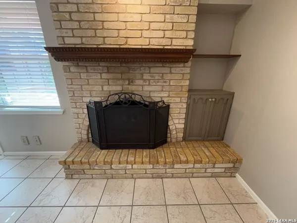 a living room with a fireplace