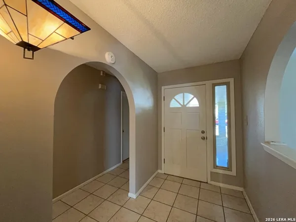 a backyard of a house with seating space