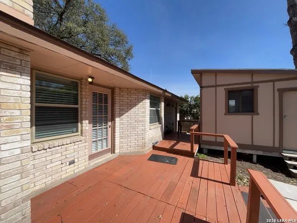 a backyard of a house with seating space