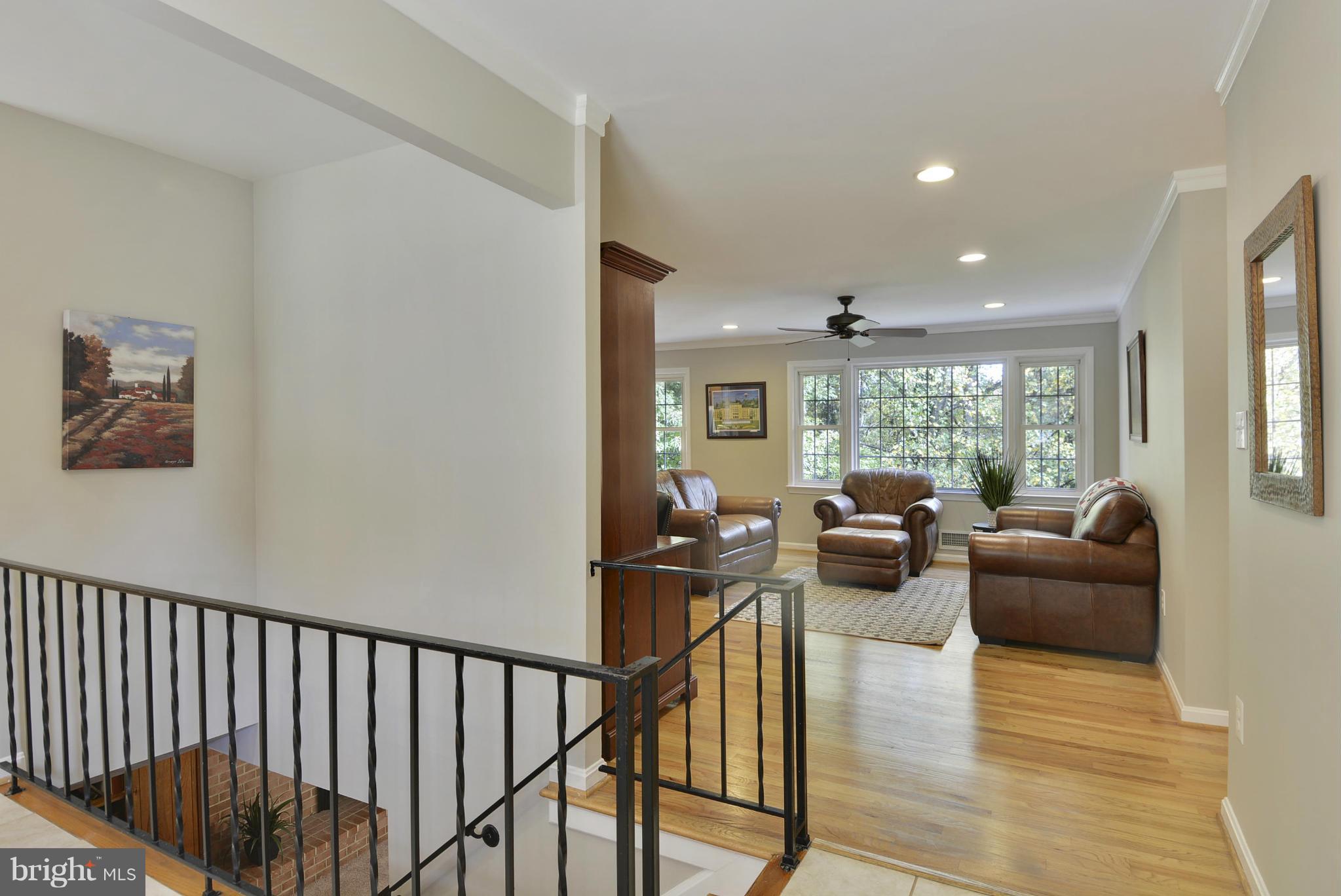 6731 Houndmaster Road Springfield, VA 22152 - Photo 15 of 30 a view of a living room filled with furniture