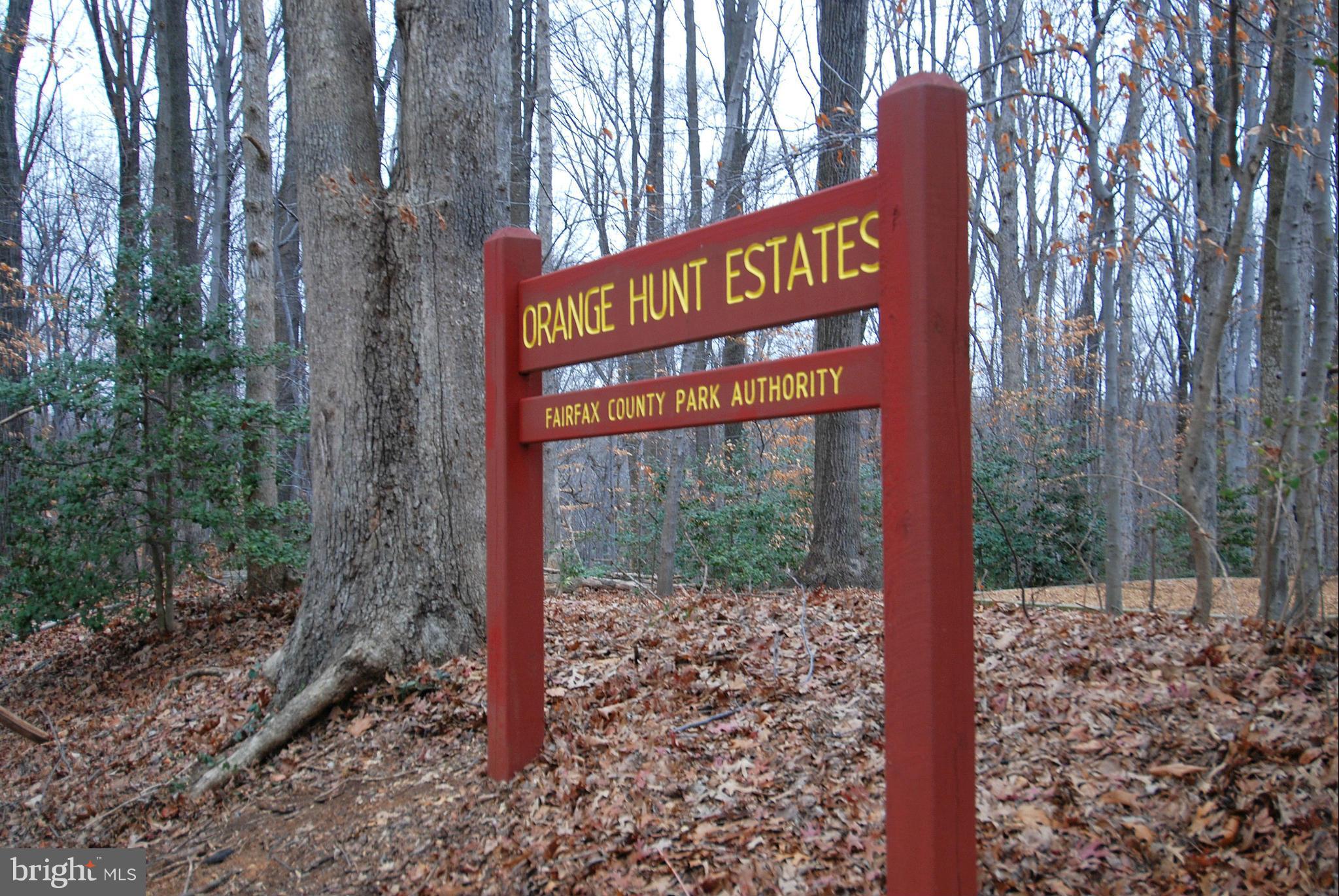 6731 Houndmaster Road Springfield, VA 22152 - Photo 27 of 30 a sign on the side of the road