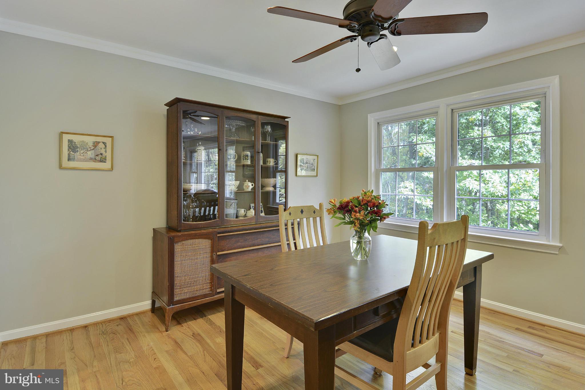 6731 Houndmaster Road Springfield, VA 22152 - Photo 7 of 30 a dining room with furniture and window