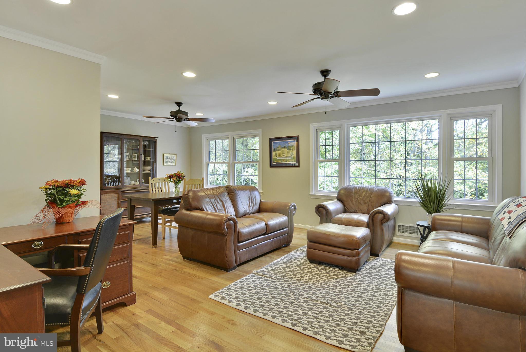 6731 Houndmaster Road Springfield, VA 22152 - Photo 9 of 30 a living room with furniture and a large window