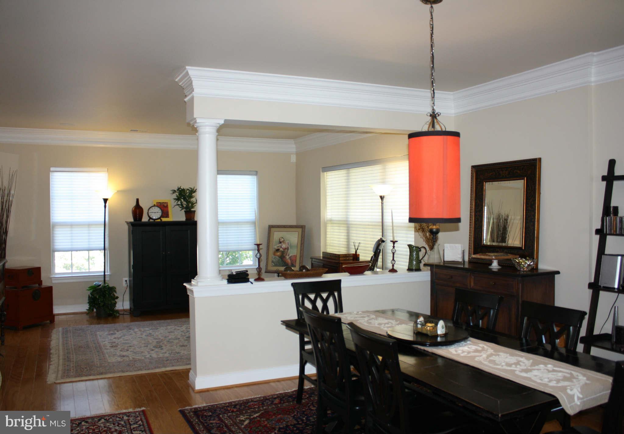 8075 Gatehouse Road, Unit 24 Falls Church, VA 22042 - Photo 4 of 24 a dining room with furniture and window