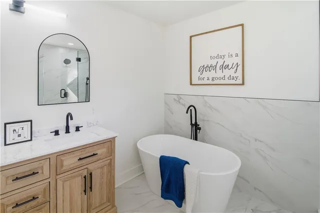 a large kitchen with a lot of counter space and a sink