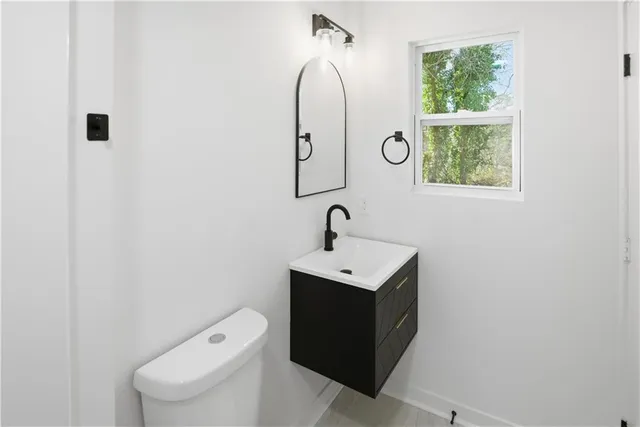 a view of a hallway with a white walls