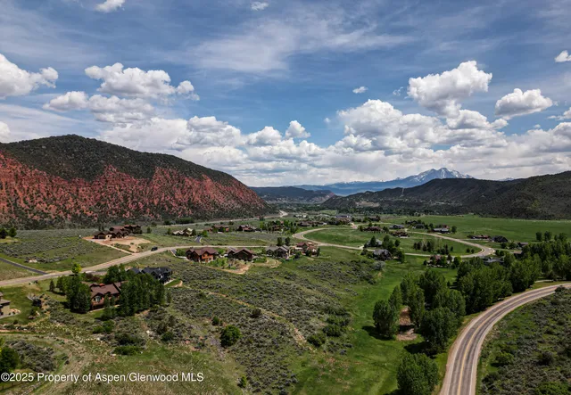 a view of a lake in middle of the town
