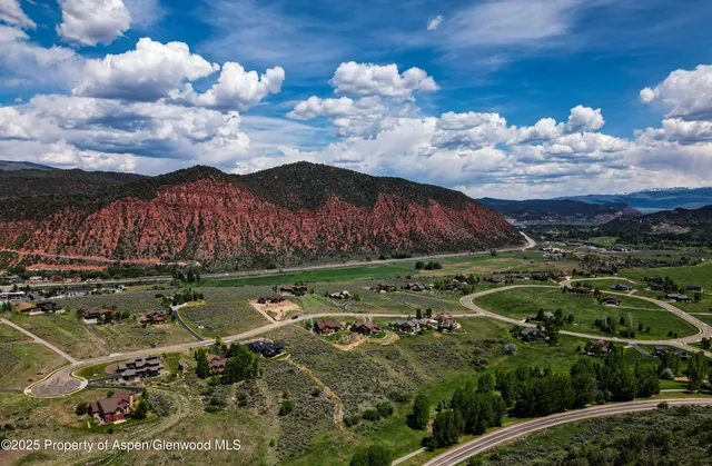 a view of a street with a houses