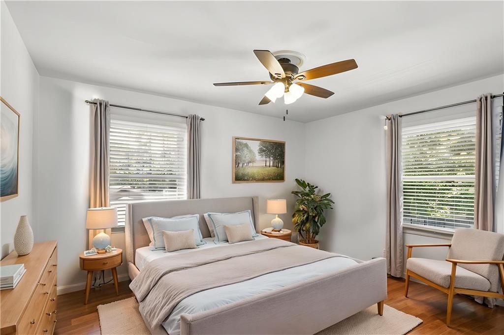 2740 Frontier Trail Atlanta, GA 30341 - Photo 23 of 29 a bedroom with a large bed and a window