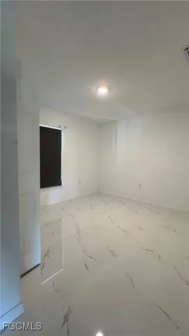 a utility room with washer and dryer