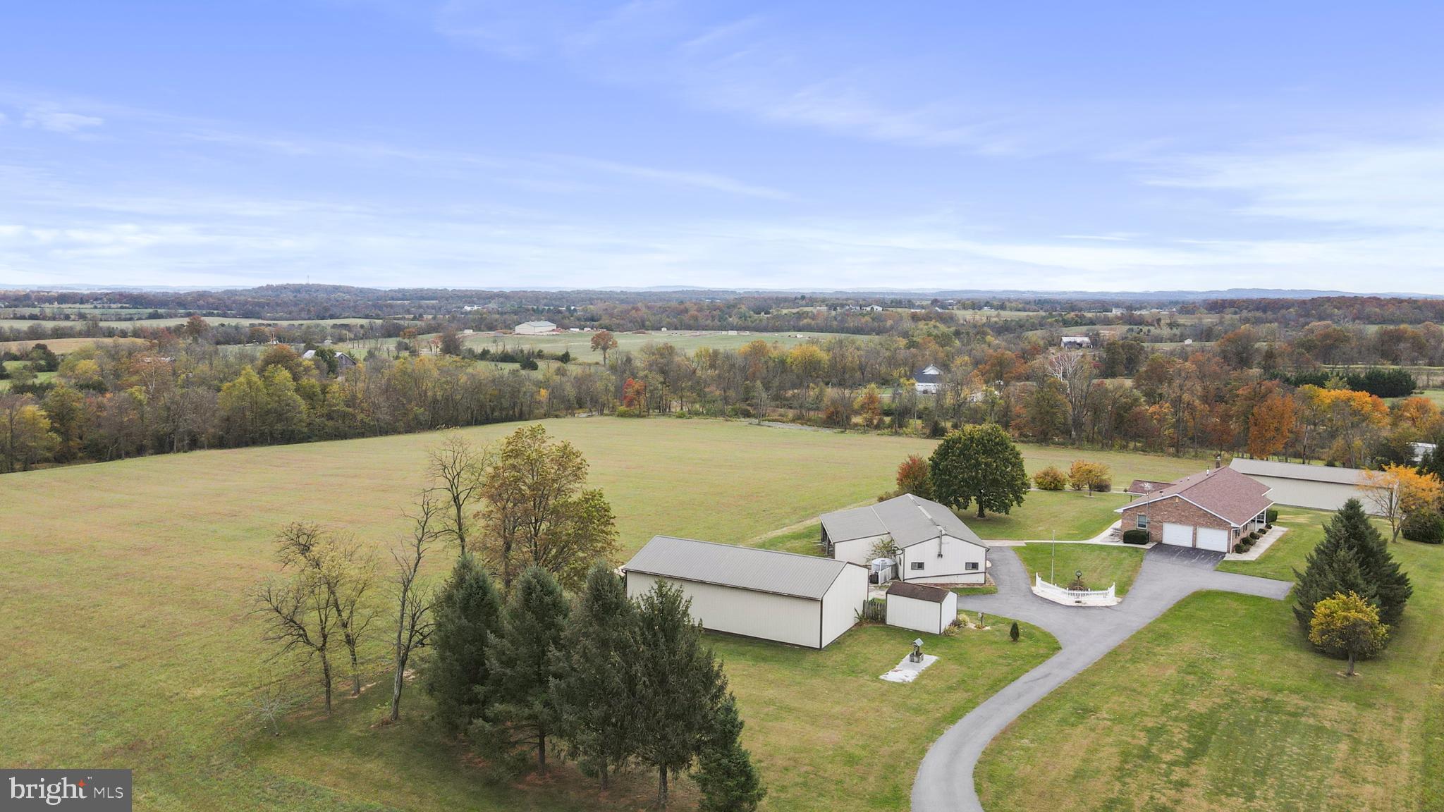 8920 Orndorff Road Emmitsburg, MD 21727 - Photo 11 of 91 a view of a lake with couches in the background