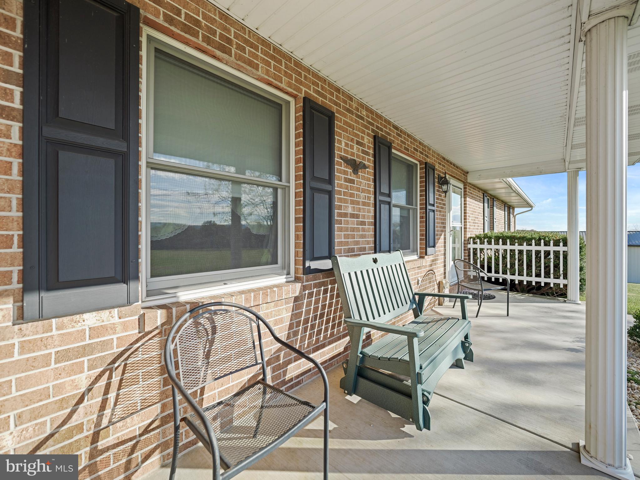 8920 Orndorff Road Emmitsburg, MD 21727 - Photo 28 of 91 a view of a chair and table in the balcony