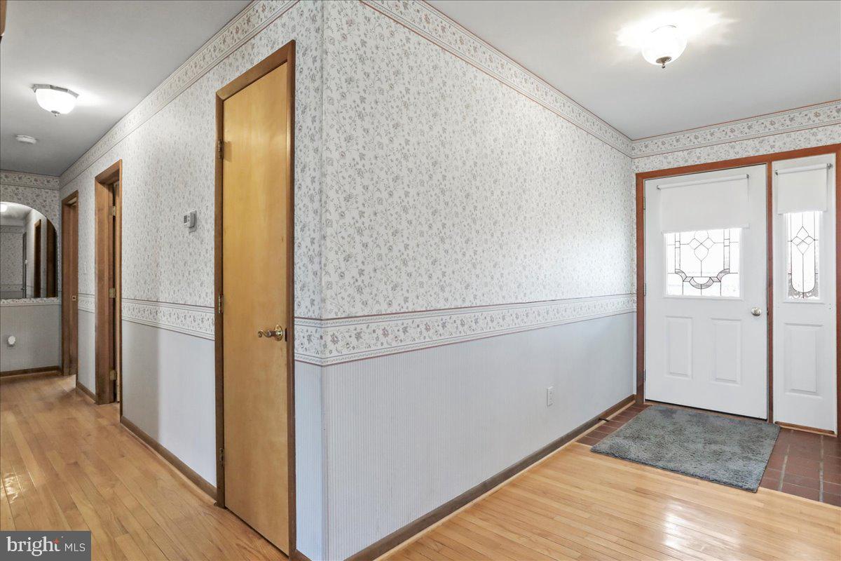 8920 Orndorff Road Emmitsburg, MD 21727 - Photo 67 of 91 a view of a hallway with wooden floor