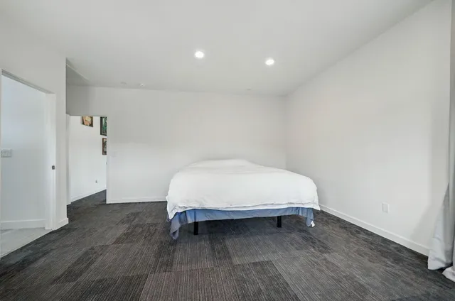 a bathroom with a sink double vanity and a mirror