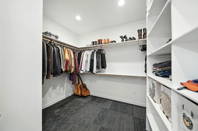 a bathroom with a toilet a sink and bathtub