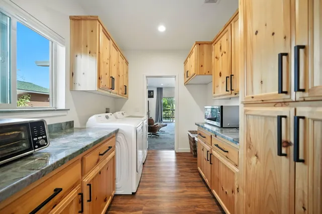 a view of a balcony with wooden floor