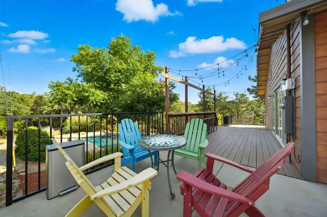 a view of balcony with wooden floor