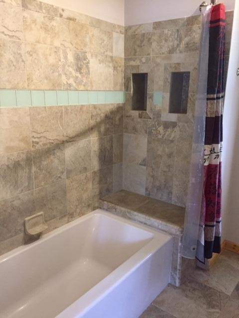 293 Harris Branch Road Madisonville, TN 37354 - Photo 15 of 31 a bath tub sitting next to a bathroom