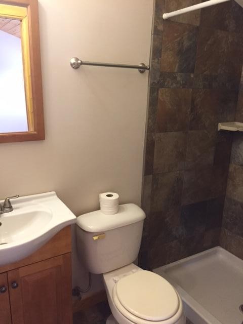 293 Harris Branch Road Madisonville, TN 37354 - Photo 18 of 31 a white toilet sitting next to a bathroom sink