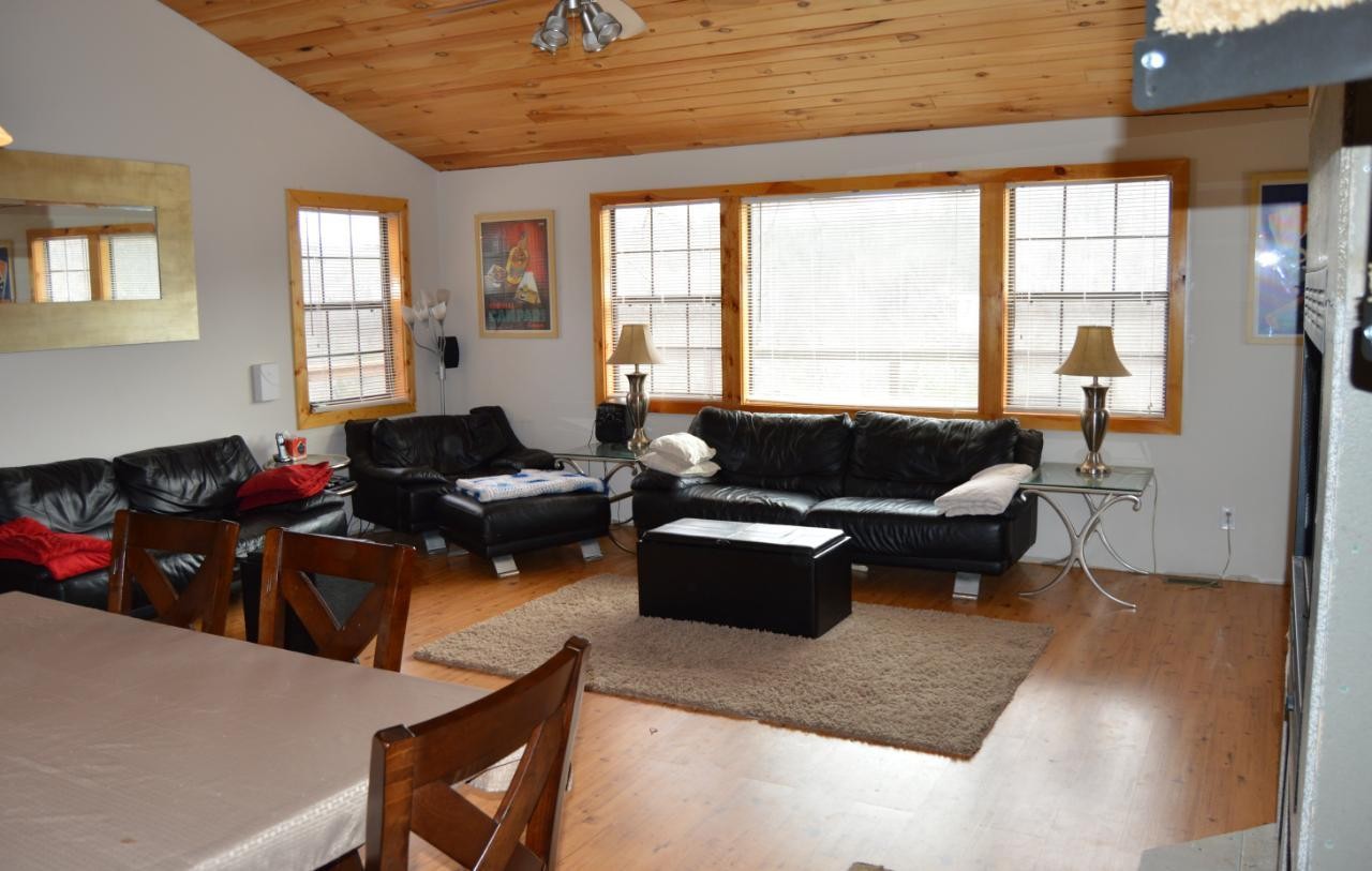 293 Harris Branch Road Madisonville, TN 37354 - Photo 27 of 31 a living room with furniture and a large window