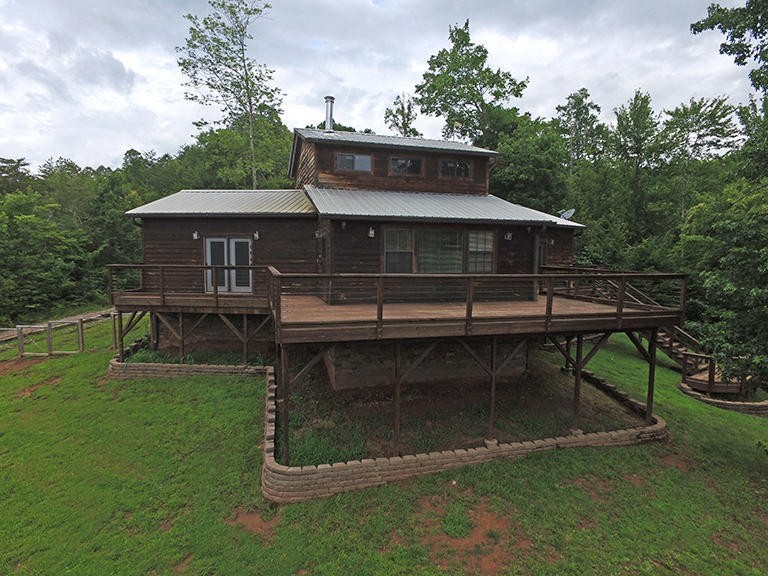 293 Harris Branch Road Madisonville, TN 37354 - Photo 31 of 31 a view of house with roof deck and entertaining space
