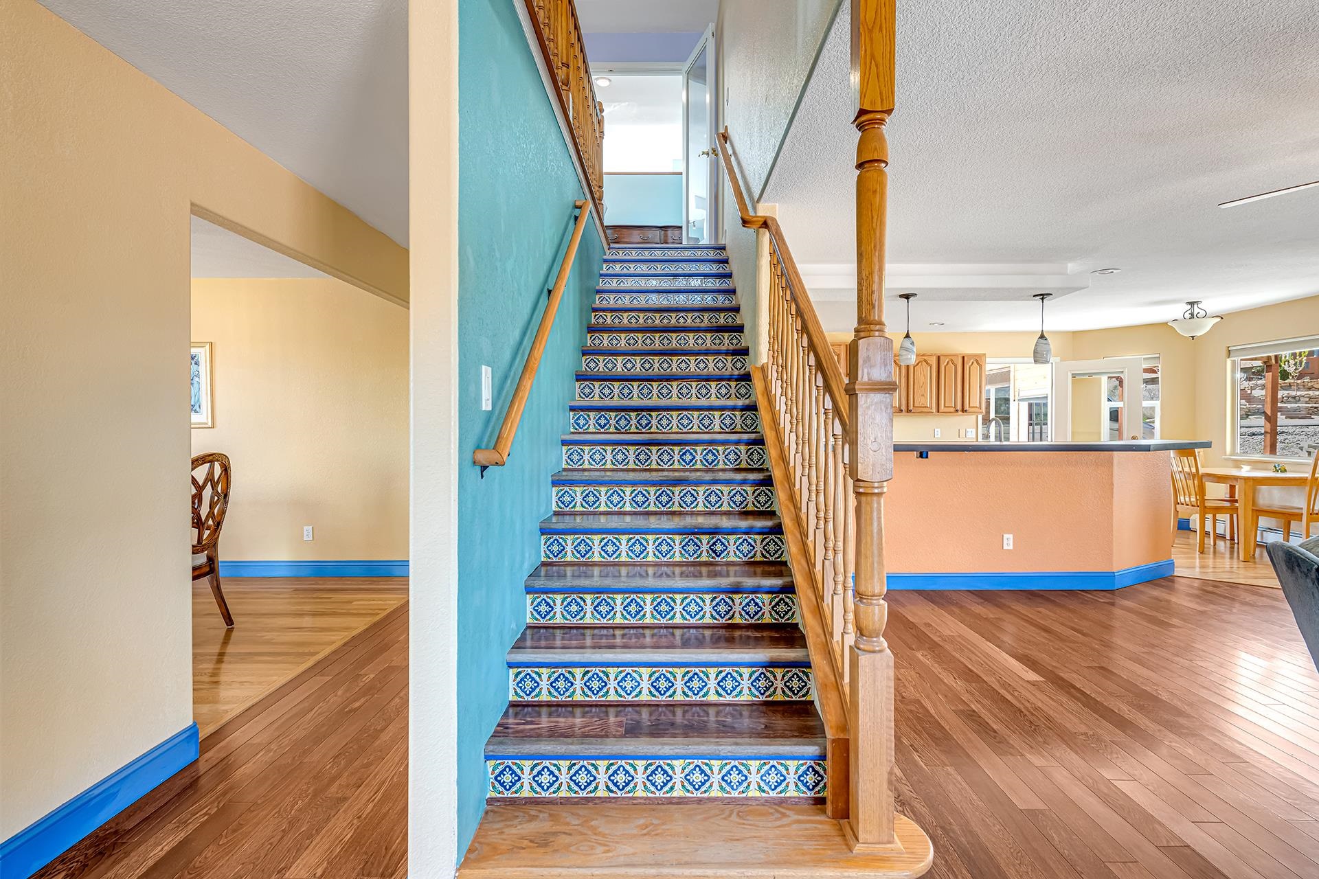 927 Crown Court Fruita, CO 81521 - Photo 21 of 42 a view of entryway and hall with wooden floor