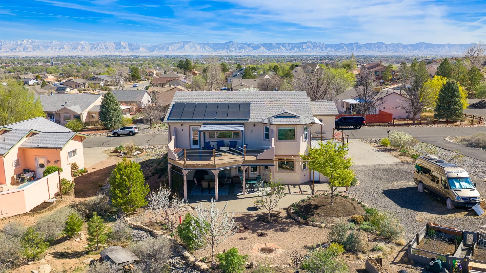 927 Crown Court Fruita, CO 81521 - Photo 35 of 42 an aerial view of a house with a garden view
