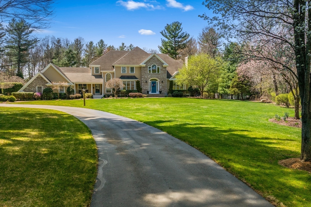 59 Anderson Farm Road Hanover, MA 02339 - Photo 3 of 38 a front view of a house with a yard