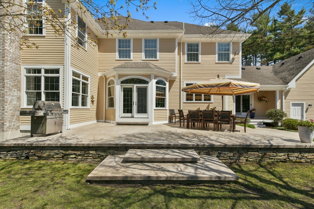 59 Anderson Farm Road Hanover, MA 02339 - Photo 32 of 38 a front view of a house with swimming pool